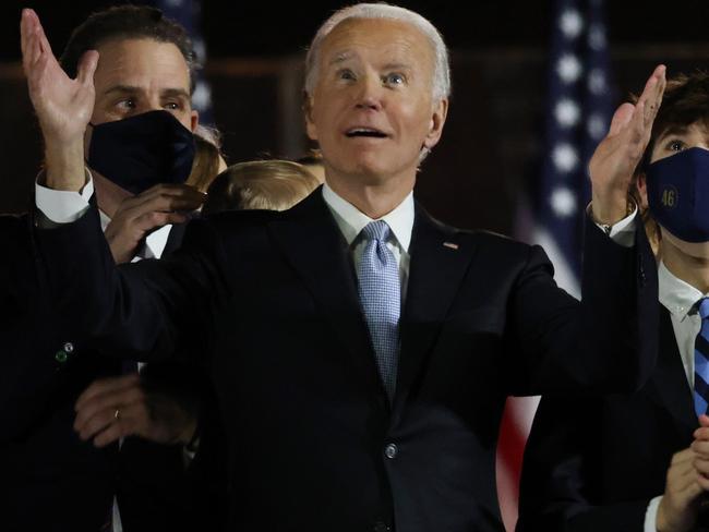 WILMINGTON, DELAWARE - NOVEMBER 07: President-elect Joe Biden and family watch fireworks from stage after Biden's address to the nation from the Chase Center November 07, 2020 in Wilmington, Delaware. After four days of counting the high volume of mail-in ballots in key battleground states due to the coronavirus pandemic, the race was called for Biden after a contentious election battle against incumbent Republican President Donald Trump.   Win McNamee/Getty Images/AFP == FOR NEWSPAPERS, INTERNET, TELCOS & TELEVISION USE ONLY ==