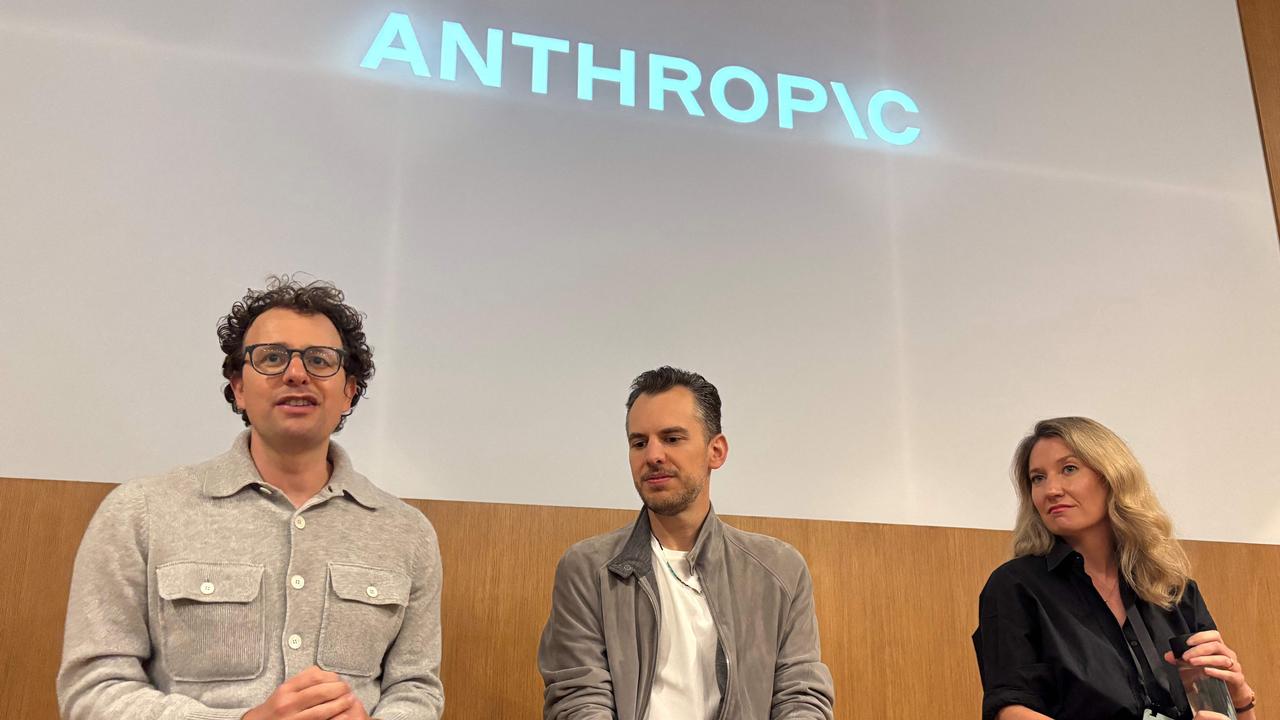 Anthropic CEO Dario Amodei (left) made some huge predictions about AI and job losses. Picture: Julie Jammot/AFP