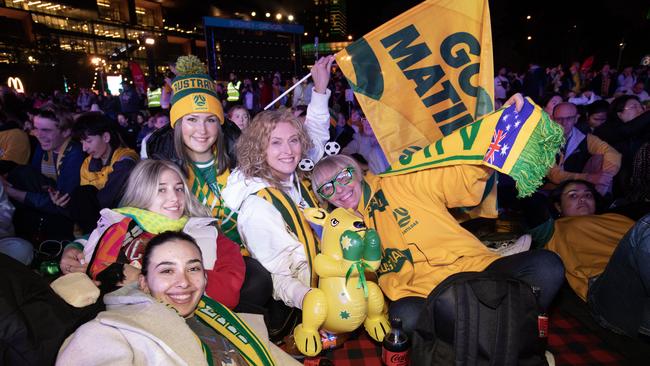 Aaliyah Ferreira, Krystal Sherry, Alexis Stampetta, Belinda Stampetta, Elisa Sherry all from Wetherill Park gather in Sydney to watch the semi final. Picture: NCA NewsWire/ Brendan Read