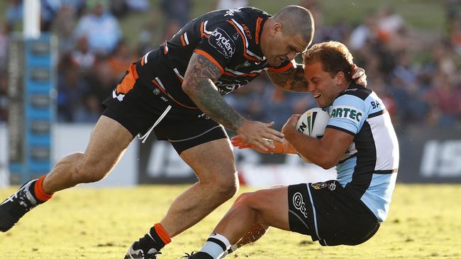 Matt Moylan cops the brunt of a Packer tackle during a trial in February. Pic: AAP