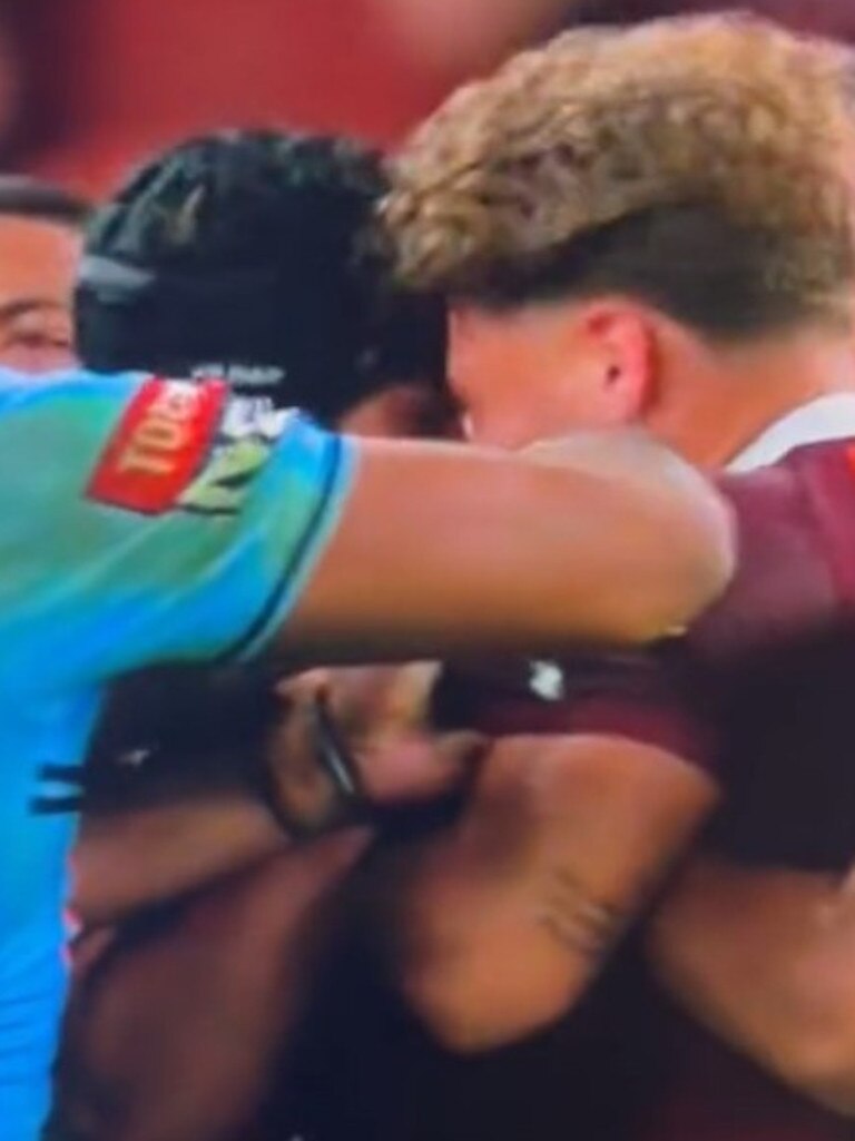 Jarome Luai and Reece Walsh headbutt each other.