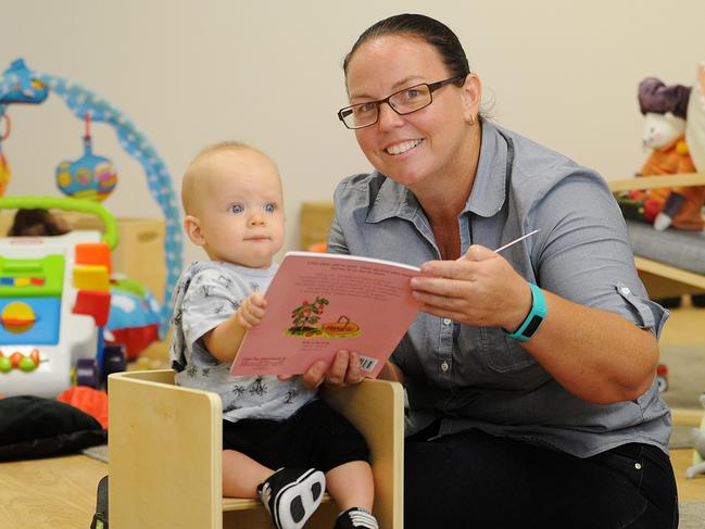 Village Kids CBD Townsville centre co-ordinator  Majella Fitzsimmons with Oliver McFarlane, 8 mths in the brand new nursery