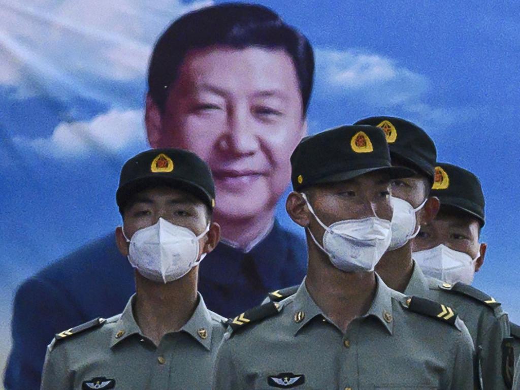 Experts say Xi Jinping will still be present in China in 2049 through imagery. Picture: Kevin Frayer/Getty Images.