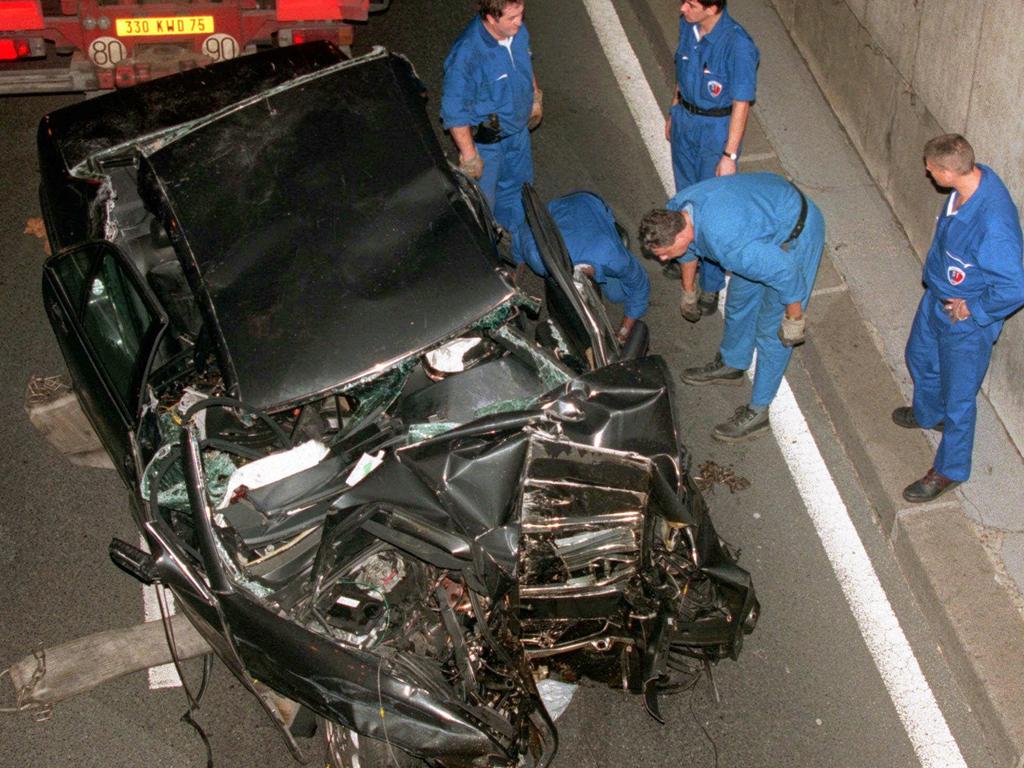 Police prepare to remove the crumpled wreck of the Mercedes-Benz at the scene, which resulted in death of Diana, Princess of Wales and Dodi Al-Fayed. Picture: Supplied.