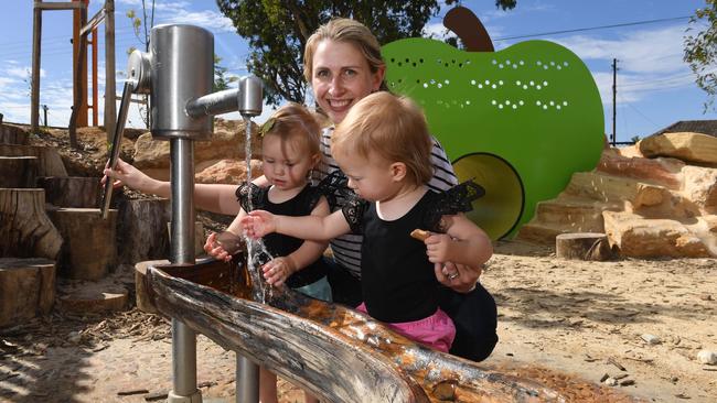 Jacqui Bullock is with her 18-month-old twin daughters Lyla and Isobel at the Jervois St Reserve. Picture: Tricia Watkinson