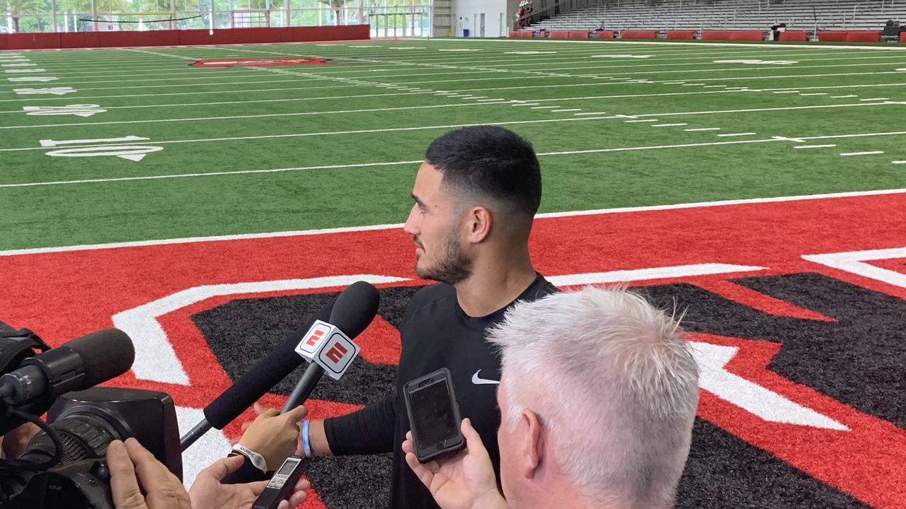 Former NRL star Valentine Holmes speaks to media at the NFL combine tryouts.