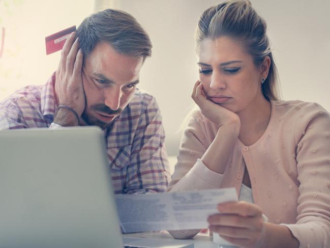 A couple having problems with their bills and money including credit card debt. Picture: iStock.