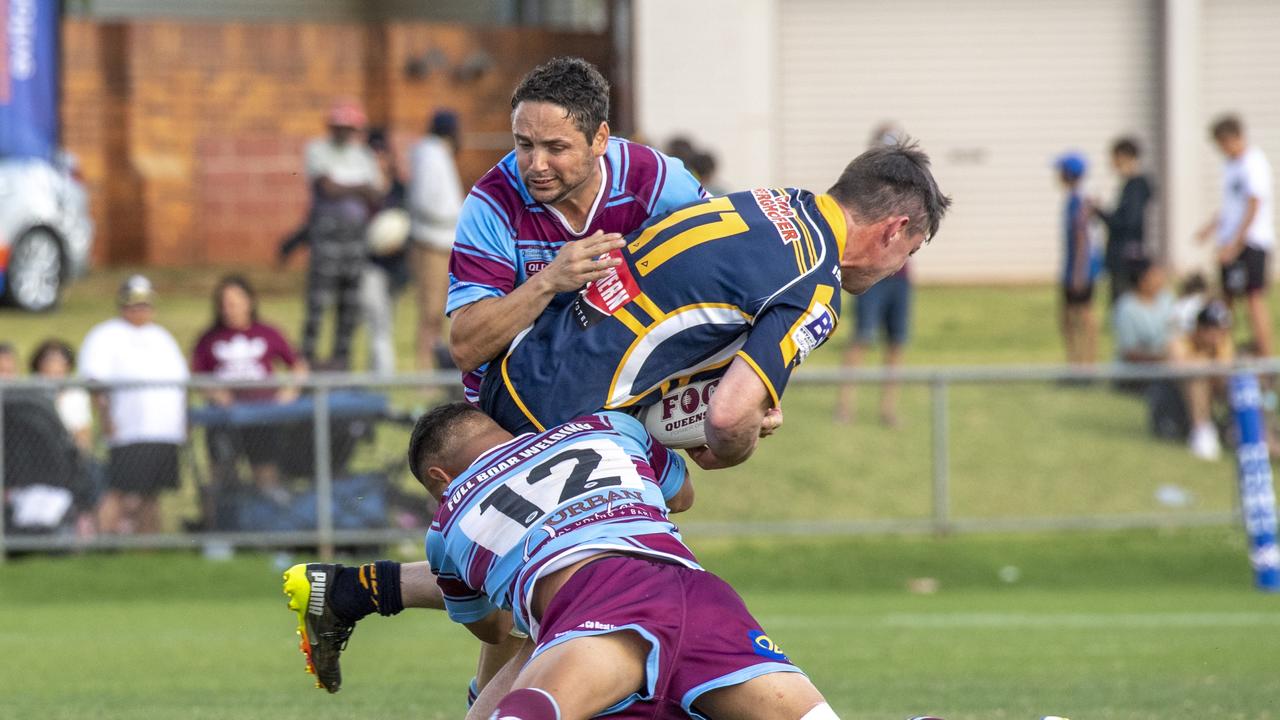 Kyle Munro and Ashley Jarrett for Goondiwindi tackle Conor Nolan for Highfields. Highfields vs Goondiwindi. 2021 Hutchinson Builders Cup A Grade final. Sunday, September 19, 2021. Picture: Nev Madsen.