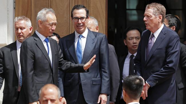 Chinese Vice Premier Liu He farewells US Treasury Secretary Steven Mnuchin and  US Trade Representative Robert Lighthizer in Washington. Pic: AP