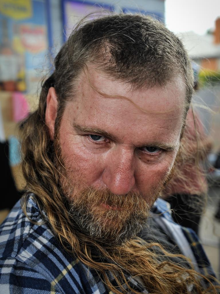 Jamie Brookes of Perth is seen during Mulletfest, a special event designed to celebrate the hairstyle that's all about business at the front, party at the back, Chelmsford Hotel, Kurri Kurri. (AAP Image/Perry Duffin) 