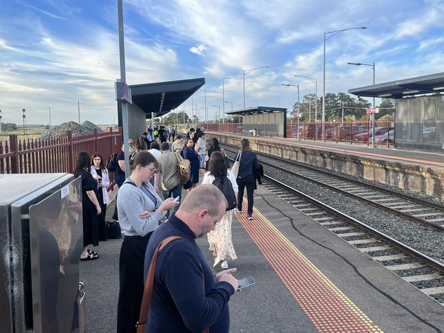 Commuters crowd on a country platform in Wallan, where patronage has increased 17 per cent year-on-year. Picture: Grace Frost