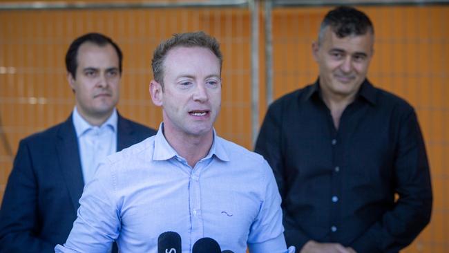 Opposition transport spokesman Vincent Tarzia, opposition leader David Speirs and Peter Kartabani at the South Rd site of Safe Place SA. Picture: Emma Brasier