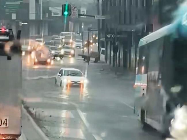 Flooding on Parramatta Road near the aptly-named Flood Street. Picture James Silver