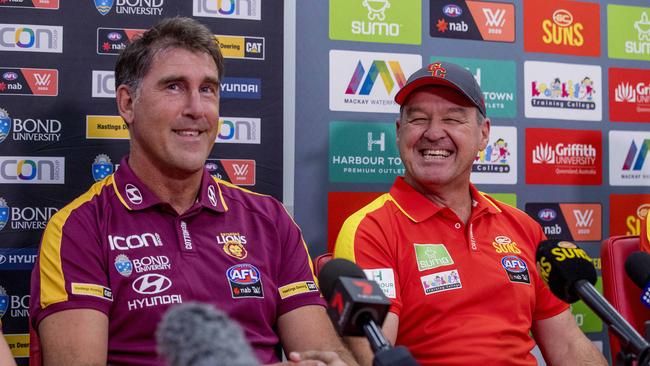 The Suns and Lions are going head to head on Saturday in the first AFLW Q-Clash. Lions Craig Starcevich and Suns coach David Lake, at Metricon Stadium, Picture: Jerad Williams