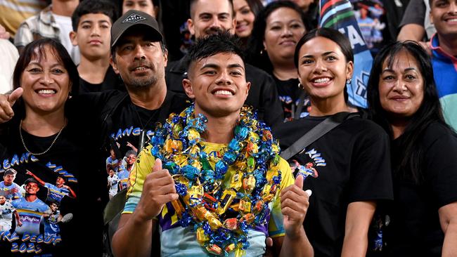 Gold Coast Titans’ Keano Kini celebrates with his family and fans after the Magic Round win over Parramatta Eels at Suncorp Stadium on May 7. Picture: Getty Images