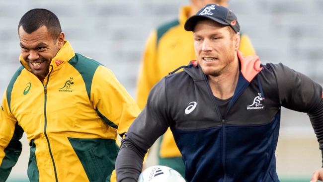 David Pocock (right) runs with Kurtley Beale at a Wallabies training session in Auckland last month. Picture: AFP