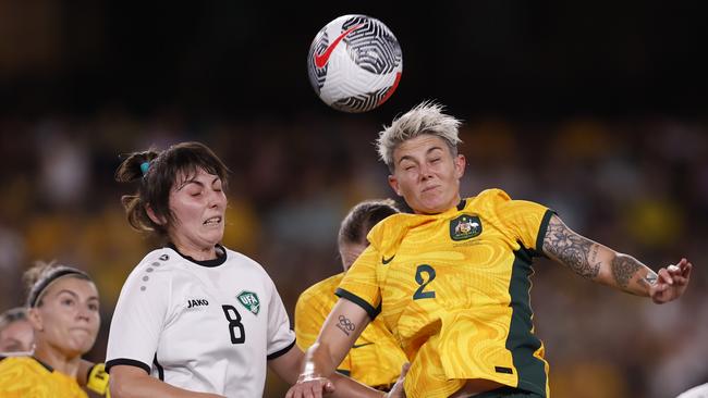 Michelle Heyman of the Matildas heads home a goal during her four-goal opening half against Uzbekistan. Picture: Darrian Traynor/Getty Images.