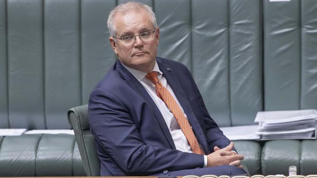 Scott Morrison ‘confused the public with messages suggesting that things could carry on as normal’, according to a Labor and Greens-dominated Senate committee. Picture: Gary Ramage