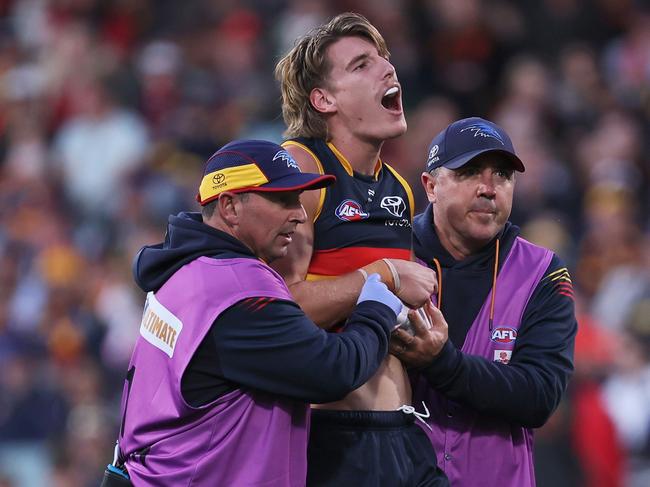 ADELAIDE, AUSTRALIA - MAY 12: Josh Worrell of the Crows is injured during the 2024 AFL Round 09 match between the Adelaide Crows and the Brisbane Lions at Adelaide Oval on May 12, 2024 in Adelaide, Australia. (Photo by James Elsby/AFL Photos via Getty Images)