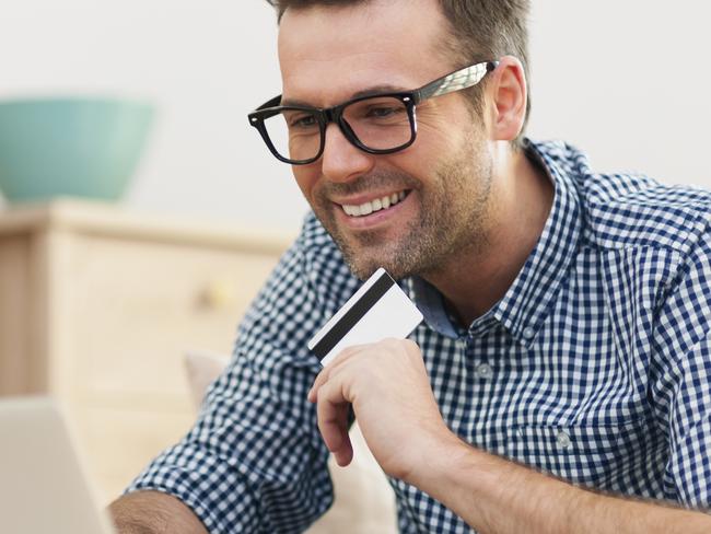 A man using a credit card to pay for goods. Picture: iStock.