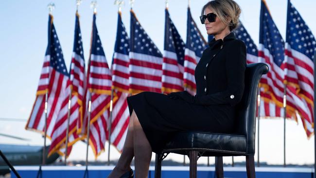 Melania Trump listens as Donald Trump addresses guests at Joint Base Andrews in Maryland on January 20, 2021. Picture: AFP.