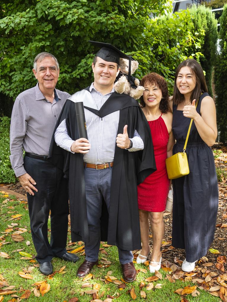 James Hearn (Bachelor of Business) is congratulated by Michael Fardouly, Lydia Hearn and Ellis Hearn (right) at the UniSQ graduation ceremony at Empire Theatres, Tuesday, December 13, 2022. Picture: Kevin Farmer