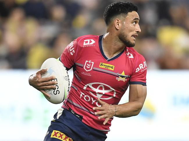 TOWNSVILLE, AUSTRALIA - AUGUST 14:  Valentine Holmes of the Cowboys runs the ball during the round 22 NRL match between the North Queensland Cowboys and the Wests Tigers at QCB Stadium, on August 14, 2021, in Townsville, Australia. (Photo by Ian Hitchcock/Getty Images)