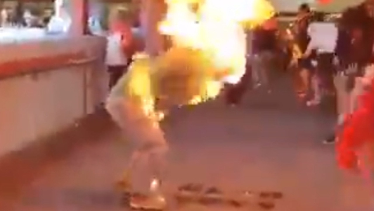 A screenshot from a video showing a pro-Beijing activist after he was set alight. Picture: Supplied