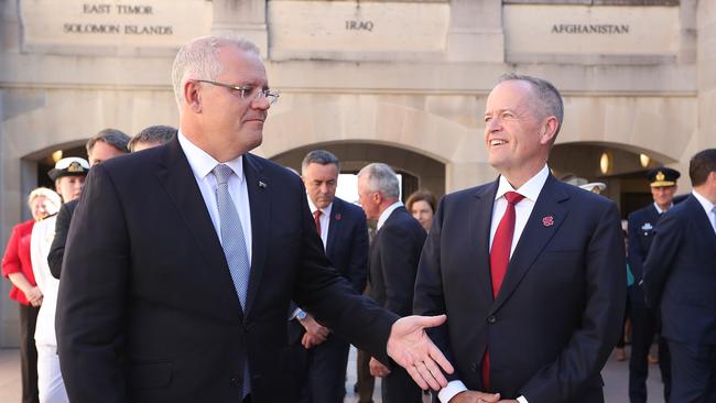 Scott Morrison and Bill Shorten at the Last Post ceremony at the Australian War Memorial in Canberra yesterday. Picture: Kym Smith