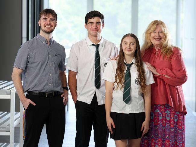 Teacher Nick Houseman, students Lincoln Harrison, 15, and Chelsea Carman, 15, with principal Sharon Amos, Park Ridge State High School. Picture: Liam Kidston