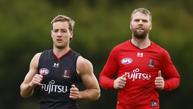 Jake Stringer (right) has been singled out after Essendon’s training standards came under scrutiny. Picture: Daniel Pockett/Getty Images