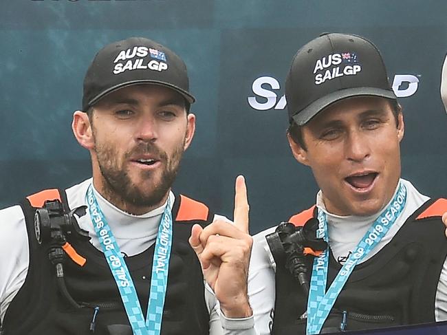 The Autralia SailGP team celebrates after winning the SailGP Final in Marseille, southern France, on September 22, 2019. - The SailGP brings together competitors from Great Britain, The United States, Australia, France, China and Japan aboard ultra-fast catamarans capable of flying 2 metres above the water. Australia team won the SailGP 2019 edition. (Photo by SYLVAIN THOMAS / AFP)