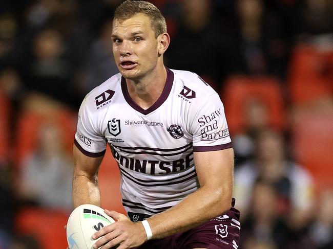 PENRITH, AUSTRALIA - MARCH 10:  Tom Trbojevic of the Sea Eagles runs the ball during the round one NRL match between the Penrith Panthers and the Manly Sea Eagles at BlueBet Stadium on March 10, 2022, in Penrith, Australia. (Photo by Cameron Spencer/Getty Images)