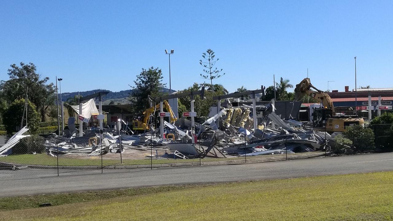 Construction crews demolish the service station. Picture: Contributed.