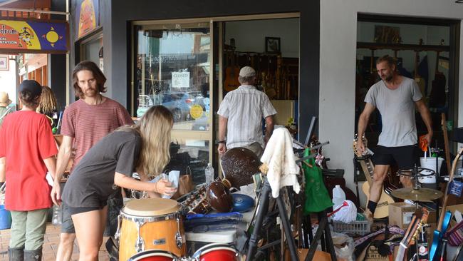 Outside the Son of Drum music shop in Burringbar St, Mullumbimby during the flood clean up response on March 4. Picture: Liana Boss