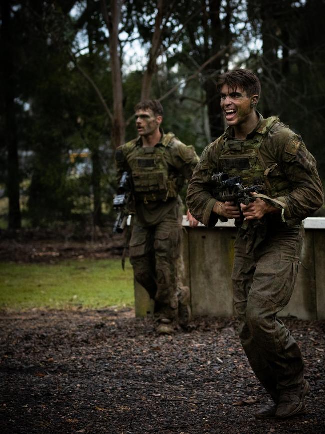Australian Army soldiers from the 3rd Battalion, Royal Australian Regiment move across the obstacle during the Duke of Gloucester Cup at the Lone Pine Barracks in Singleton. *** Local Caption *** Australian Army infantry soldiers from across Australia tested their core skills for the prestigious Duke of Gloucester Cup at the School of Infantry, near Singleton in NSW, July 31 - August 5 2022. The Duke of Gloucester Cup is the Armyâ€™s premier military skills competition, pitting the best Royal Australian Corps of Infantry rifle sections from each unit against one another through a series of challenging activities that test their core infantry skills, including marksmanship, tactics, teamwork and fitness. Along with the Duke of Gloucester Cup, five other trophies are awarded: Sir Arthur MacDonald Trophy for best foundation war-fighting skills; Gurkha Trophy for best live-fire shooting; Royal Ulster Rifles Trophy for best falling plate shooting; OSCMAR Trophy for best battle endurance; and the DSM Roche CSC Memorial Cup for best individual soldier. The Duke of Gloucester Cup was created by Prince Henry, Duke of Gloucester, in 1946, while serving as the Governor-General of Australia.