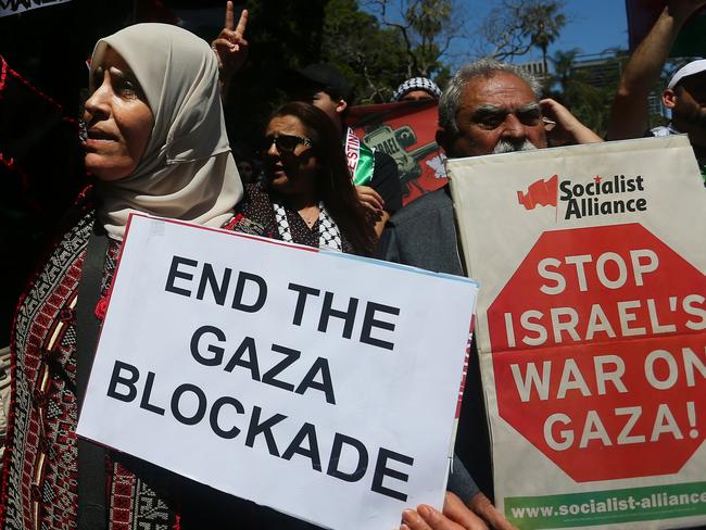 SYDNEY, AUSTRALIA - OCTOBER 15: Palestine supporters gather during a protest at Hyde Park on October 15, 2023 in Sydney, Australia. The Palestinian militant group Hamas launched a surprise attack on Israel from Gaza by land, sea, and air, last weekend, killing over 900 people and wounding more than 2000, recent agency reports said. Reports also said Israeli soldiers and civilians have been kidnapped by Hamas and taken into Gaza. The attack prompted a declaration of war by Israeli Prime Minister Benjamin Netanyahu, and ongoing retaliatory strikes by Israel on Gaza killing hundreds in the aftermath. (Photo by Lisa Maree Williams/Getty Images)