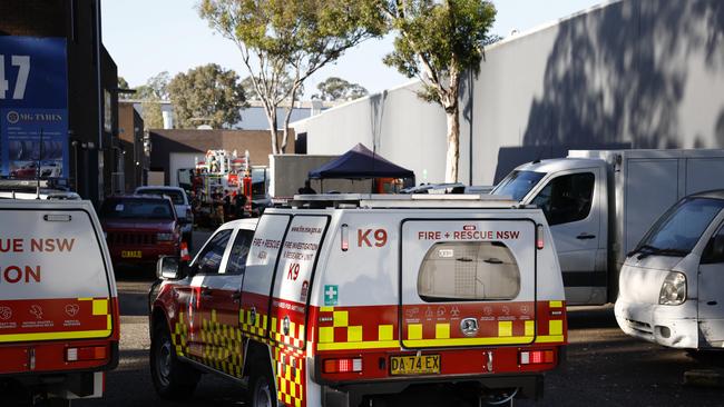 Fire and Rescue NSW on the scene of the building fire, 48 hours after police uncovered a drug lab inside the Revesby mechanic shop. Picture: Richard Dobson