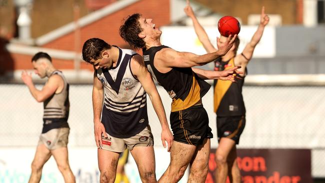 Tom Schnerring celebrates on the final siren. Picture: Hamish Blair