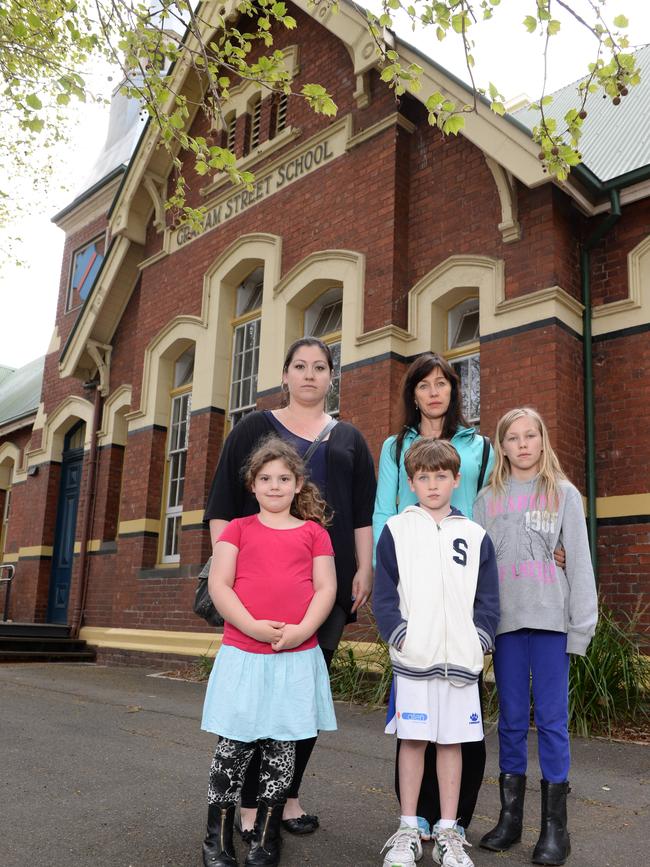 Low-income families at Port Melbourne Primary School are disappointed about the State Government's decision to cancel the school's Education Maintenance Allowance funding of $150-200 per child. Single mum Rachel Lederman relies on the allowance for her kids Lucinda and Quincy. Picture: Lawrence Pinder