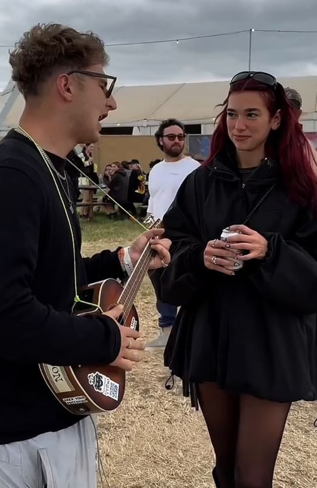Dua Lipa has a cringe-worthy interaction with a busker at Glastonbury.