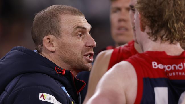 MELBOURNE, AUSTRALIA - AUGUST 10:  Simon Goodwin, Senior Coach of the Demons speaks to his players during the round 22 AFL match between Melbourne Demons and Port Adelaide Power at Melbourne Cricket Ground, on August 10, 2024, in Melbourne, Australia. (Photo by Darrian Traynor/AFL Photos/via Getty Images)