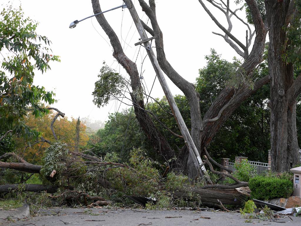 Storm damage is seen in Gordon, north of Sydney, Tuesday, November 26, 2019. A severe fast moving thunderstorm has passed over Sydney resulting in fallen trees and downed power lines in several Sydney suburbs. (AAP Image/Dan Himbrechts)