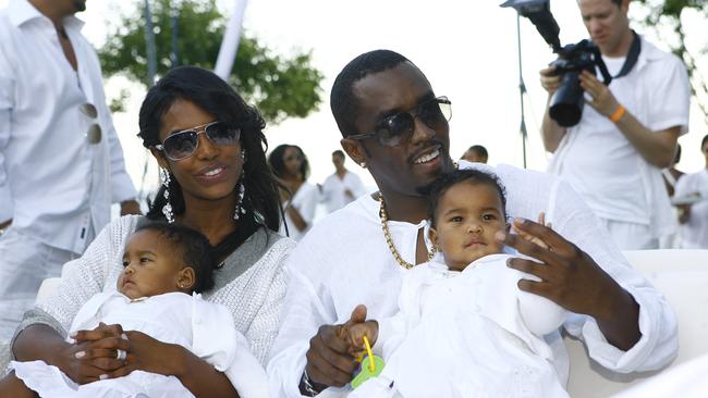 Sean "Diddy" Combs and Kim Porter with their twin daughters D'Lila Star Combs and Jessie James Combs. Photo: Mat Szwajkos/CP/Getty Images.