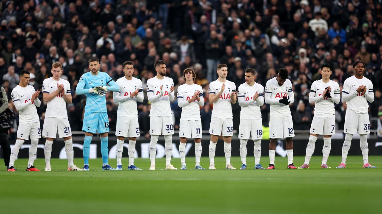 Tottenham Hotspur players pause for a minutes applause following the recent passing of former English football player and manager, Terry Venables. Photo by Julian Finney/Getty Images.