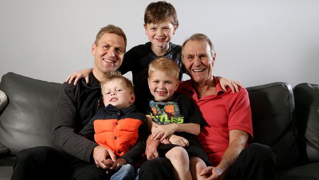 Graham Cornes, right, with son Kane Cornes and his children Sonny, Eddy (top) and Raphael in 2014. Picture: Calum Robertson