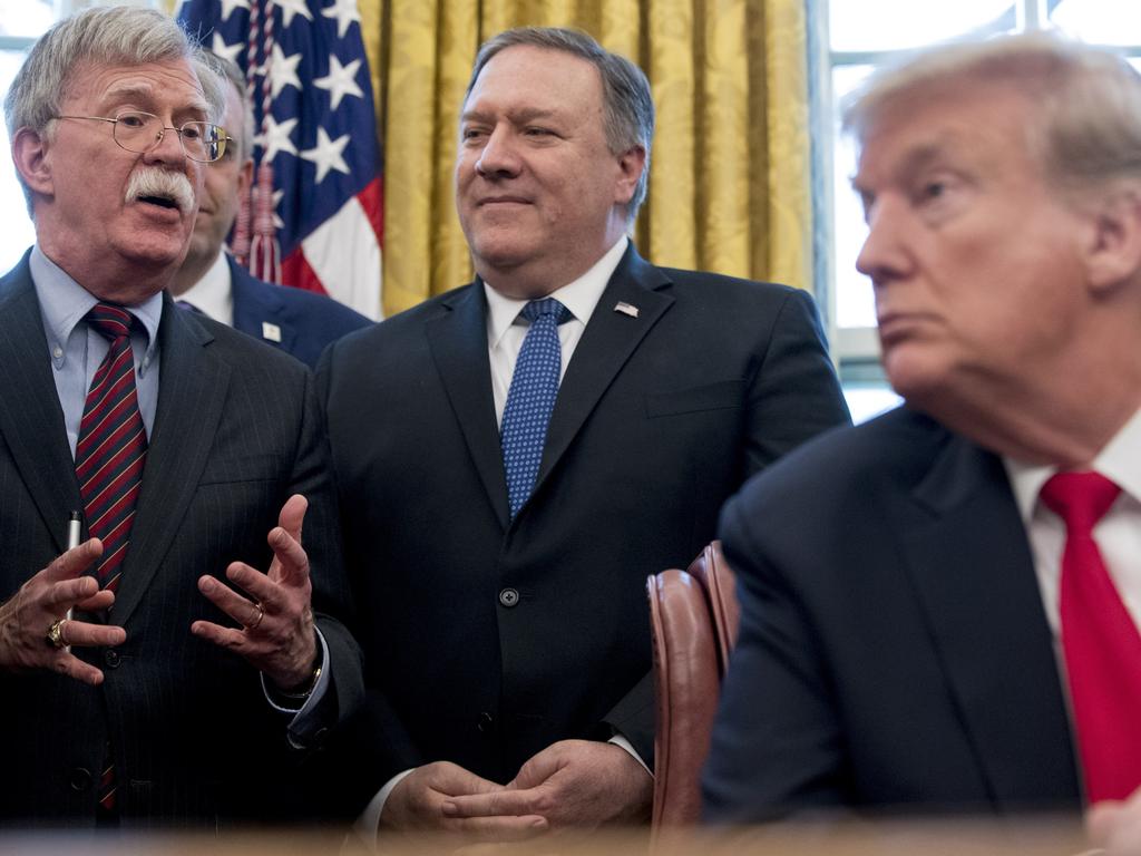 Security adviser John Bolton, Secretary of State Mike Pompeo, and President Donald Trump. Bolton says he resigned but Trump tweeted he was asked for his resignation. Picture: AP