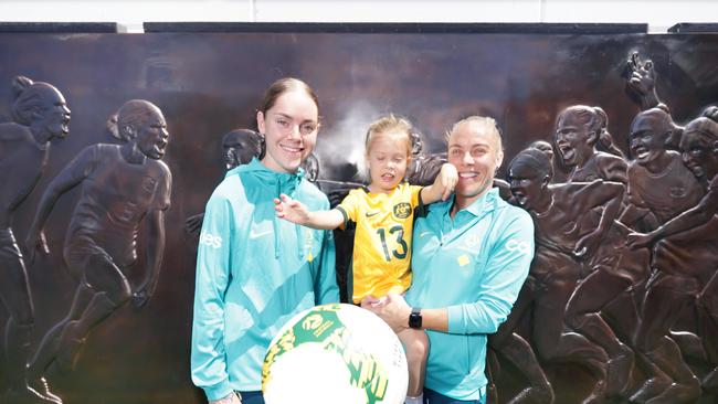 Matildas forward Sharn Freier (left), Tameka Yallop and her daughter Harley Rose at the unveiling. Picture: Steve Pohlner