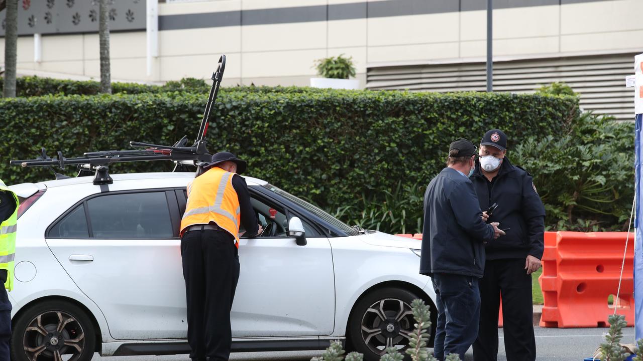 The hard border and long Queues return to the Qld NSW border on the Gold Coast. People getting the thumbs up or turned away in Griffith St Coolangatta. Picture: Glenn Hampson.