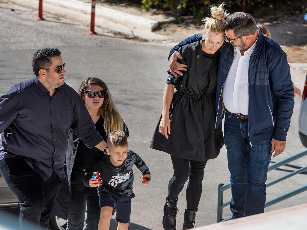 Victoria Karida , wife of John Macris, surrounded by friends and fmaily at the funeral of John Macris. Picture: Angelos Christofilopoulos/News Corp